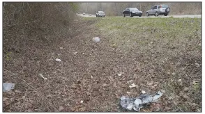  ?? (NWA Democrat-Gazette/Flip Putthoff) ?? Drivers pass litter on March 7 along Arkansas 12 in Rogers. The highway is one of several in Northwest Arkansas that could use a spring cleaning.