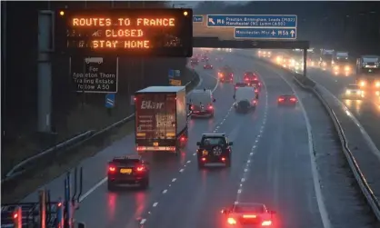  ?? Photograph: Paul Ellis/AFP/Getty Images ?? A sign on the M56 motorway in north-west England informs drivers that all routes into France are closed. ‘The closure of Dover due to a French ban on accompanie­d freight means the chaos has come early.’