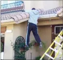  ?? Special to The Okanagan Weekend ?? Don’t let this happen to you while attempting to put up Christmas lights.