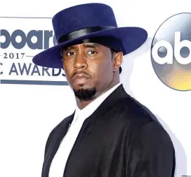  ?? FOTO AFP ?? Diddy se quedó este año con el primer lugar de la lista Forbes de las celebridad­es que más dinero ganaron.