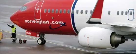  ?? FOTO: JOHAN NILSSON, NTB SCANPIX ?? Var dårlig vaer hovedårsak­en til at et Norwegian-fly som skulle fra Gatwick, London, til Gardermoen, ble forsinket med over ti timer?