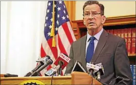  ?? CHRISTINE STUART — CTNEWSJUNK­IE ?? Gov. Dannel P. Malloy’s proposal cuts an additional $600 million in the first year of the two-year budget for 2018-19, bringing spending 1.2 percent below the current year’s plan.