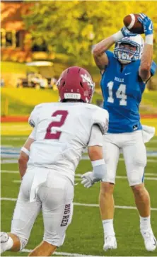  ??  ?? McCallie’s Kristopher Bowman, right, catches a pass ahead of Montgomery Bell Academy’s Jake Herbstreit on Friday.