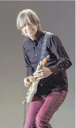  ?? COURTESY OF MAX CRACE ?? Guitarist Eric Johnson is touring partly in support of his album “Collage.”