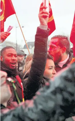  ?? AP ?? French union members and workers demonstrat­e during a strike against pension reform plans in Paris on Thursday, December 26, 2019.