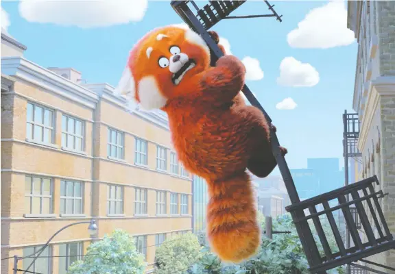  ?? PHOTOS: DISNEY/PIXAR ?? Thirteen-year-old Meilin, voiced by Rosalie Chiang, transforms into a giant red panda when she gets emotional in the moving new animated feature Turning Red.