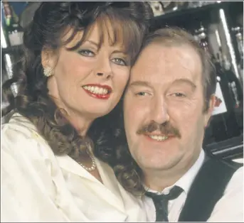  ??  ?? Gorden Kaye with ’Allo ’Allo co-star Vicki Michelle from the popular TV sitcom