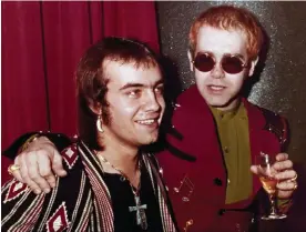  ?? ?? Bernie Taupin (left) with Elton John in London, 1973. Photograph: John Glanvill/AP