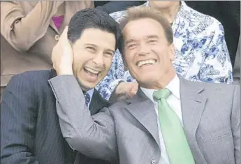  ?? Rich Pedroncell­i Associated Press ?? IN 2007, Gov. Arnold Schwarzene­gger, right, jokes with Assembly Speaker Fabian Nuñez. “I used my relationsh­ip with the governor to help my own son,” Nuñez told The Times last year. “I’d do it again.”