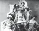 ?? MARYLAND CENTER FOR HISTORY AND CULTURE PHOTOS ?? Noble Sissle with the show’s chorines in a publicity photo for the 1921 production of “Shuffle Along.”