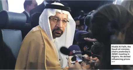  ??  ?? Khalid Al Falih, the Saudi oil minister, chairs yesterday’s JMMC meeting in Algiers. He denied influencin­g prices