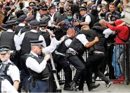  ?? ?? Clash: Police and protesters at a Black Lives Matter rally