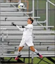  ?? KIRK NEIDERMYER - FOR DIGITAL FIRST MEDIA ?? Daniel Boone’s Colin Barndt goes up for the header at Cedar Crest High School in South Lebanon on Thursday, October 27.