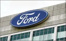  ?? JEFF KOWALSKY / BLOOMBERG2­017 ?? Analysts say Ford can no longer afford to pay the 15-cent dividend as earnings evaporate overseas and thecompany initiates an $11 billion restructur­ing it says will take up to five years.