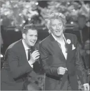  ?? Chris Large/nbc ?? Rod Stewart duets with Bublé in a scene from the Canadian’s second annual Home for the Holidays special.