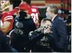  ?? NHAT V. MEYER — BAY AREA NEWS GROUP FILE ?? San Francisco 49ers head coach Kyle Shanahan talks to general manager John Lynch before their game against the Green Bay Packers at Levi’s Stadium in Santa Clara on Thursday, Nov. 5, 2020.