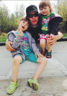  ?? CELINA DANIS ?? Chad Wiklun, pictured with daughters Casey and Carsyn, died after an Aug. 8, 2016 accident at Agrium Inc.’s potash mine near Vanscoy, Sask. A blood drive has been launched in his memory.