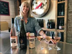  ?? ?? Contribute­d
Jennifer Tuton-Molgat showcases The View Winery’s flights of pinks, including the new Hotel Eldorado 2022 Regatta Rosé, its label showcasing a heritage image of the Kelowna Regatta.