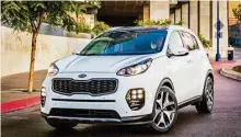  ?? Kia photos ?? Outside, all body panels are new, juxtaposin­g smooth curves meld with sharp creases. Chrome trim, sloping roofline, sharply raked rear window, longer and more aerodynami­c spoiler and bolder wheel arches give the CUV a more dynamic appearance.