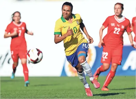  ?? STEVEN GOVERNO, EPA ?? In a nation that banned women from soccer as late as 1979, Brazil’s Marta hopes “to inspire girls ... to believe in themselves.”