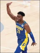  ?? ANDY LYONS/GETTY IMAGES ?? Kelan Martin of the Indiana Pacers celebrates during action against the Charlotte Hornets in Indianapol­is on Tuesday.