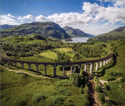  ??  ?? Clockwise from left; Walkers on Ben A’an; Glenfinnan Viaduct; the beaches at Loch Morlich; and Barra