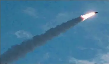  ?? AFP ?? Photo taken on July 25, 2019 and released by North Korean news agency KCNA shows a tactical missile being launched at an undisclose­d location in North Korea. Pyongyang has now test-fired ballistic missiles twice in a week.