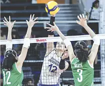  ?? CONTRIBUTE­D PHOTO ?? Alyssa Solomon of National University powers through the blockers of De La Salle University during the Shakey’s Super League at the Rizal Memorial Coliseum on Saturday, Nov. 19, 2022.