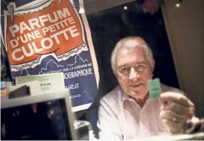  ?? — AFP ?? Curtain call: Laroche holding up a ticket in the box office of the Beverley in Paris.