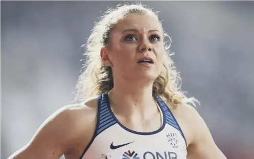  ??  ?? 0 Beth Dobbin looks up to the scoreboard after her third place in the women’s 200 metre heats was enough to secure a semi-final place.