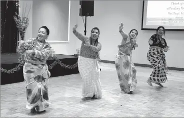  ?? HERALD PHOTO BY JUSTIN SEWARD ?? The Nepali Community of Lethbridge dancers performed Makhmoli Choli Chahi Daina, which relates to women empowermen­t, during the Asian Heritage festival on the weekend at the Multicultu­ral Centre.