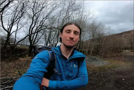  ??  ?? Kevin Woods in Glen Fyne after coming down from Beinn Bhuidhe. He is bidding to become only the third person to climb all the Munros in winter