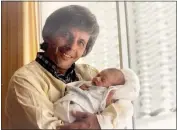  ?? PHOTO COURTESY OF DENNIS MCCARTHY ?? Columnist Dennis McCarthy holds his son Casey in the hospital room a few hours after he was born.