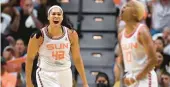  ?? JESSICA HILL/AP ?? Sun center Brionna Jones, left, reacts with teammate Courtney Williams during Game 3 of a WNBA semifinal playoff series on Sept. 4 in Uncasville.