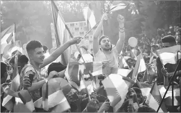  ??  ?? Iraqi Kurds fly Kurdish flags during an event to urge people to vote in the upcoming independen­ce referendum in Arbil, the capital of the autonomous Kurdish region of northern Iraq. — AFP photo