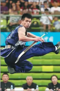  ?? WANG ZHUANGFEI / CHINA DAILY ?? A wushu athlete competes at the Chinese National Games in Tianjin.