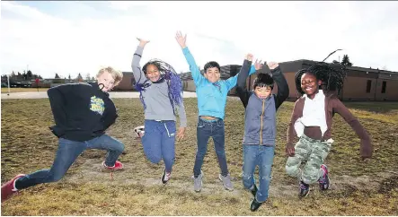  ?? JIM WELLS ?? From left, Gerrit Surette, Nevaeh Lee, Daniel Mercader, Theo Minoso, Sophie Loding, all Grade 6 students at St. Peter Elementary School, visit the school’s empty playground site. The school is a finalist in the Kraft Heinz Power Play contest to win $250,000 for a new playground.