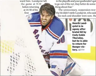  ?? GETTY ?? Henrik Lundqvist is in agony after brutal hit by Cody Eakin Thursday, but he is able to return for Ranger victory.