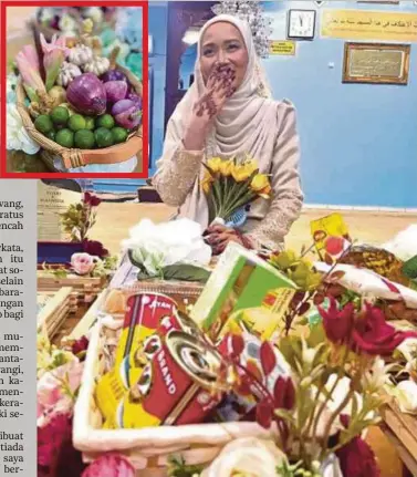  ?? ?? SITI Masnida bersama dulang hantaran unik berupa barang keperluan dapur. Gambar kecil, satu daripada dulang hantaran yang digubah sendiri.