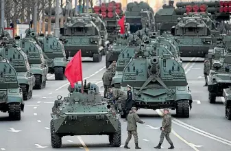  ?? AP ?? Russian military vehicles gather in Moscow’s Tverskaya St, near Red Square, prior to a rehearsal yesterday for the Victory Day parade on May 9. The Kremlin has rejected speculatio­n that Moscow plans to use the event to formally declare war with Ukraine.