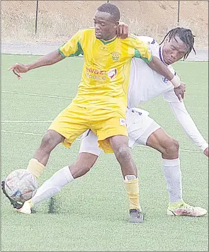  ?? (File pic) ?? Madlenya striker Njabulo Maziya shielding the ball away from Royal Leopard’s Thami Zulu.