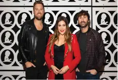  ?? (Brett Carlsen/St. Jude Children’s Research Hospital/Getty Images/TNS) ?? FROM LEFT: Charles Kelley, Hillary Scott and Dave Haywood of Lady Antebellum.