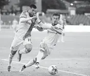  ?? JON BLACKER AP ?? Star forward Alejandro Pozuelo, left, has 30 goals and 27 assists in four seasons with Toronto FC.