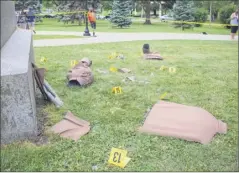  ?? Paul Buckowski / Times Union ?? A Civil War statue honoring a Saratoga regiment which fought alongside Union forces during the war was smashed to pieces in Saratoga Springs’ Congress Park on Thursday.