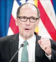 ?? Andrew Harnik Associated Press ?? LABOR Secretary Thomas Perez discusses a judge’s ruling blocking the overtime pay rule change in June.