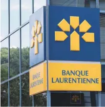  ?? PAUL CHIASSON LA PRESSE CANADIENNE ?? L’objectif de la direction de la Banque Laurentien­ne est de faire passer le réseau de 150 à 100 succursale­s.
