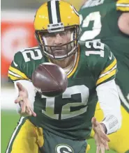  ?? WM. GLASHEEN / USA TODAY NETWORK-WISCONSIN ?? It’s uncertain whether quarterbac­k Aaron Rodgers will be there when the Packers open training camp next week.