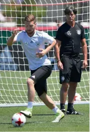  ?? — AFP ?? Germany coach Joachim Loew (right) at a training session for the Confederat­ions Cup football tournament in Sochi, Russia, on Saturday.