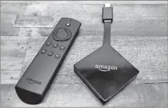  ?? File, Elaine Thompson / AP ?? There are a wide variety of TV-streaming devices such as Amazon’s Fire TV on the market. Choosing the right one is a matter of choosing between options.
