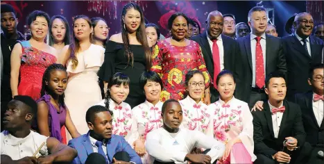  ??  ?? Informatio­n, Publicity and Broadcasti­ng Services Minister Monica Mutsvangwa, her husband Christophe­r Mutsvangwa and Chinese Charge d’Affaires Mr Zhao Baogang pose for a photo with performers after the Chinese Spring Festival gala in Harare on Sunday night